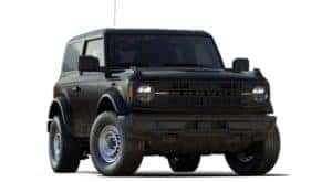 A black 2021 Ford Bronco two-door is angled right.