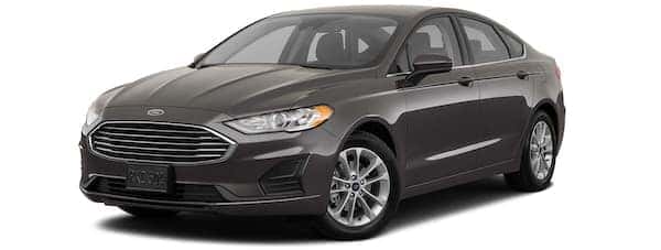 A black 2020 Ford Fusion is angled left.