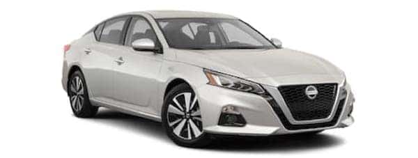 A white 2020 Nissan Altima is angled right.