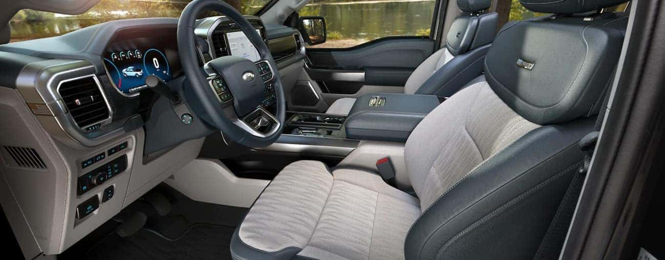 The black and white interior is shown in a 2021 Ford F-150.