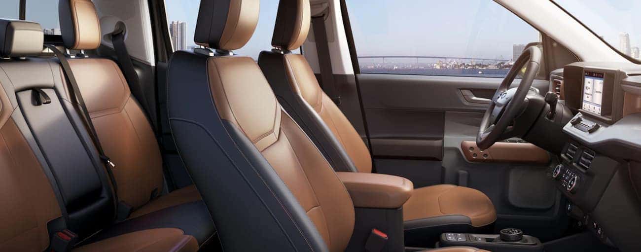 The interior of a 2022 Ford Maverick shows two rows of seating.