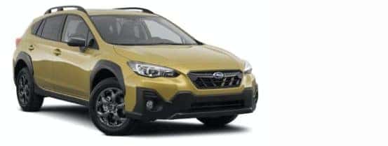 A yellow 2021 Subaru Crosstrek is angled right.