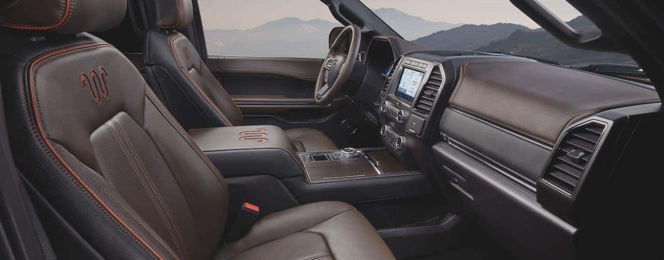 The black and brown interior is shown in a 2021 Ford Expedition King Ranch.