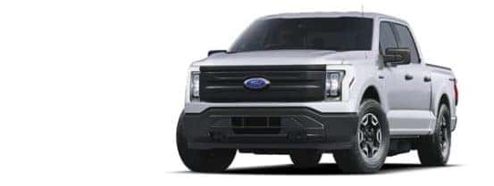 A white 2022 Ford F-150 Lightning Pro is angled left.
