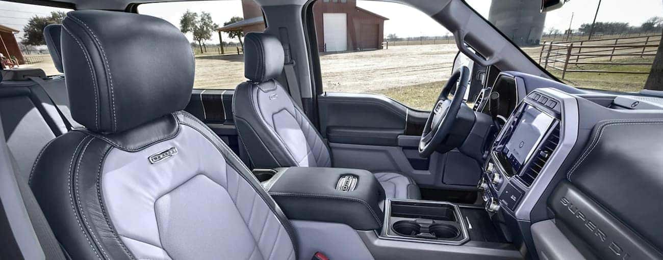 The interior of a 2022 Ford Super Duty shows the steering wheel and cab.
