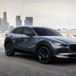 Mazda CX 30 driving down road