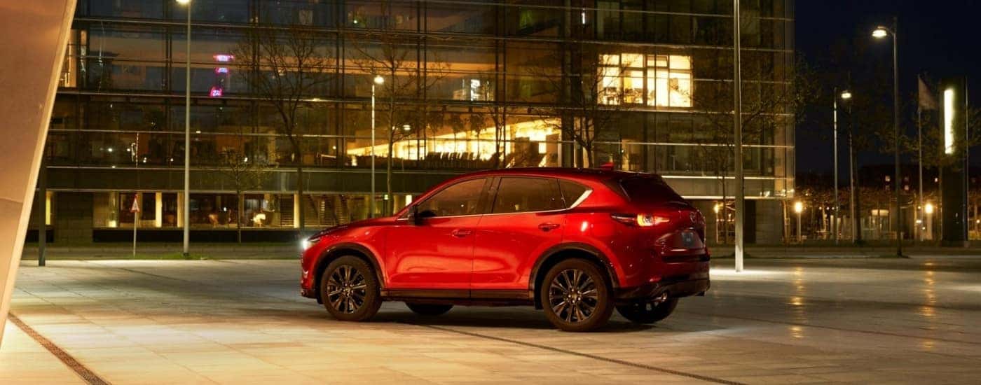 A red 2026 Mazda CX-5 for sale from the side.