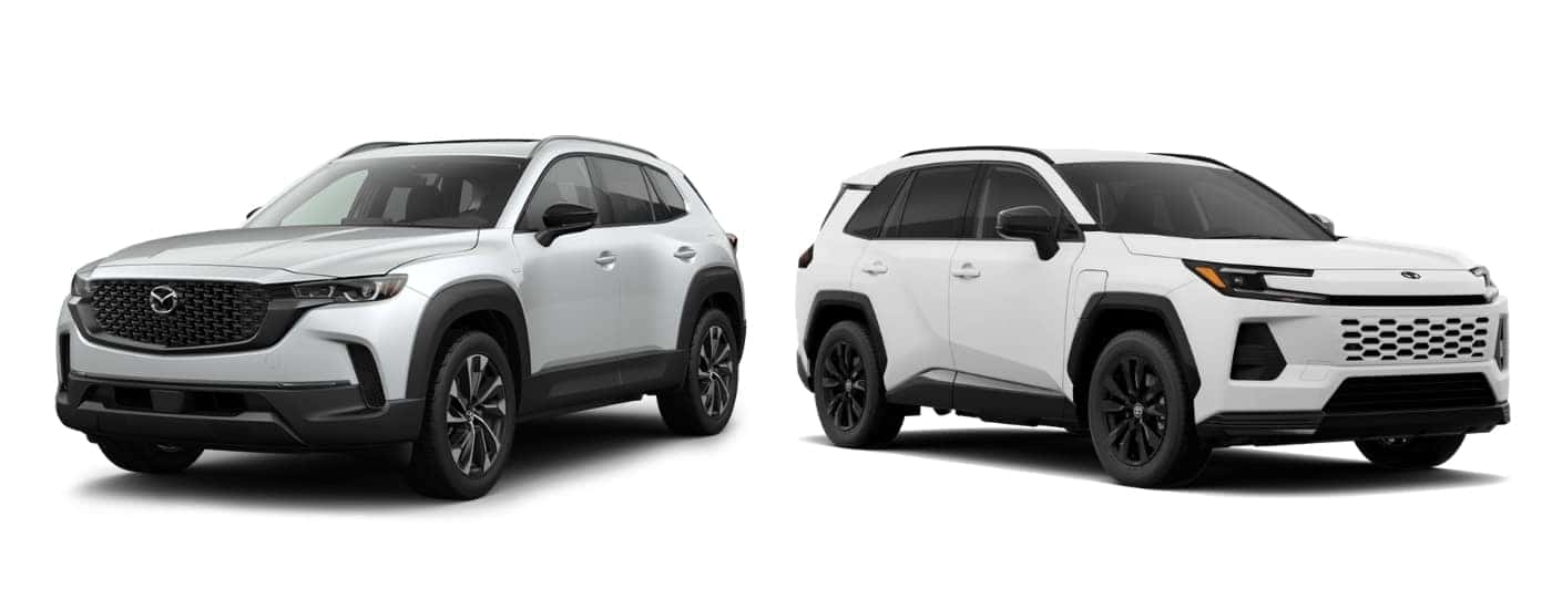 White 2026 Mazda CX‑50 Hybrid Premium Plus angled left and 2026 Toyota RAV4 PHEV SE angled right