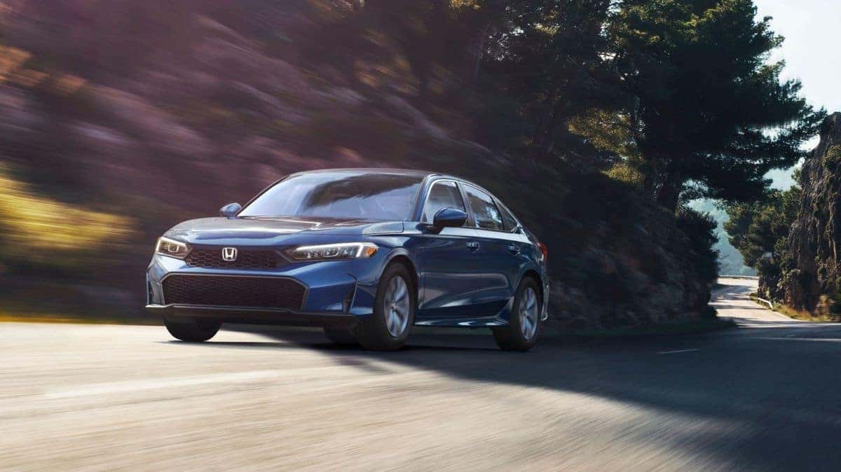 2026 Honda Civic LX sedan in Blue Lagoon Pearl