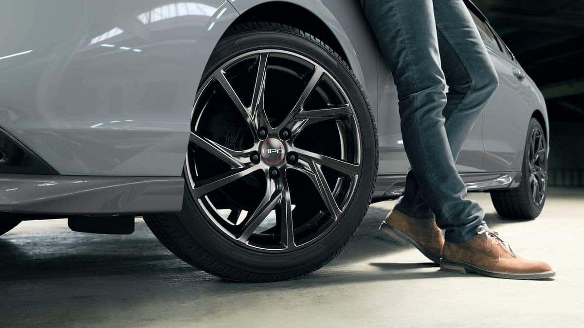 Close-up of 2026 Honda Accord 19-inch black alloy wheel