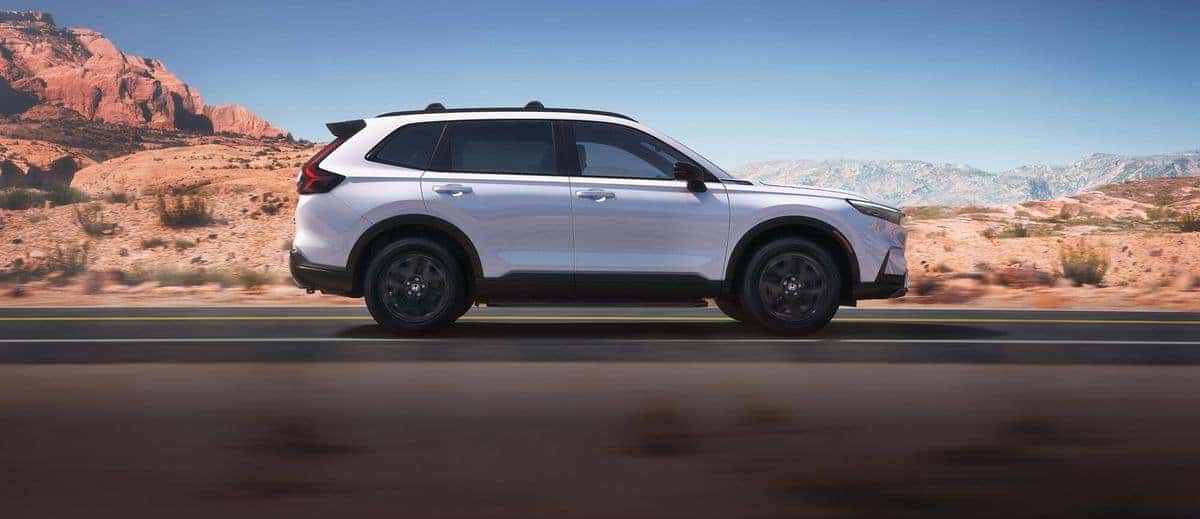 2026 Honda CR-V Sport Touring Hybrid side profile in Platinum White Pearl
