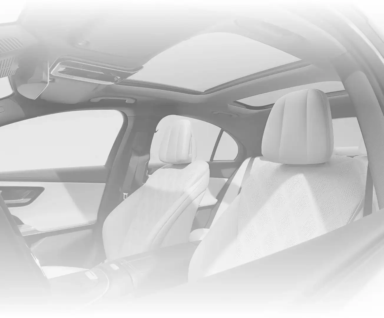 Rear cabin of the C-Class in light upholstery, shown in black and white.