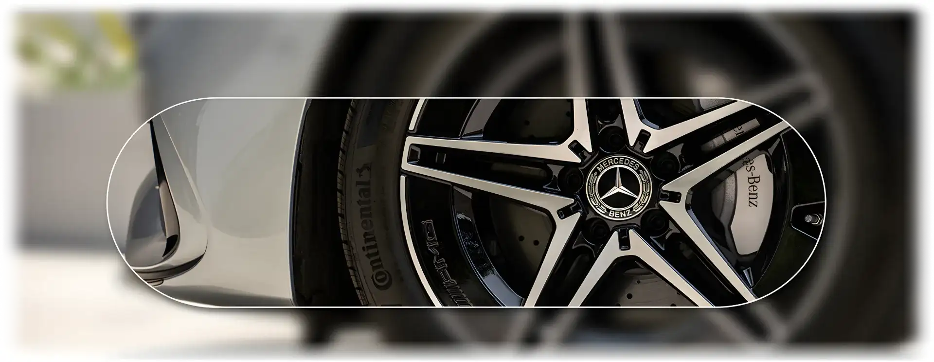 Illuminated Star-pattern grille on the C 300 4MATIC Sedan, lit in red and blue.
