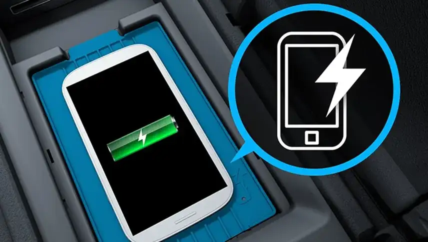 Phone charging wirelessly in the C-Class centre console tray.