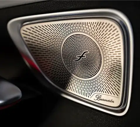 Burmester speaker grille set into the C-Class door trim.