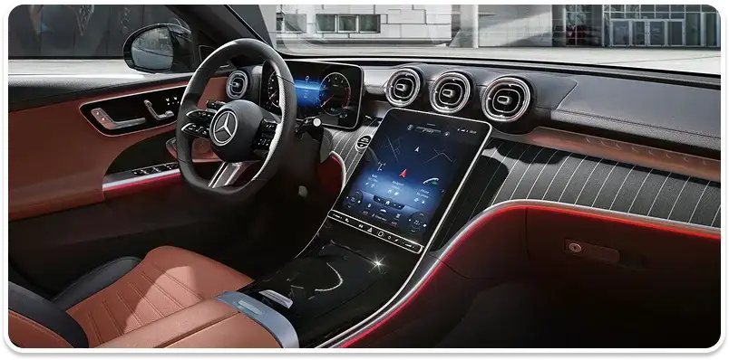 C-Class cockpit in saddle brown with the portrait central touchscreen.