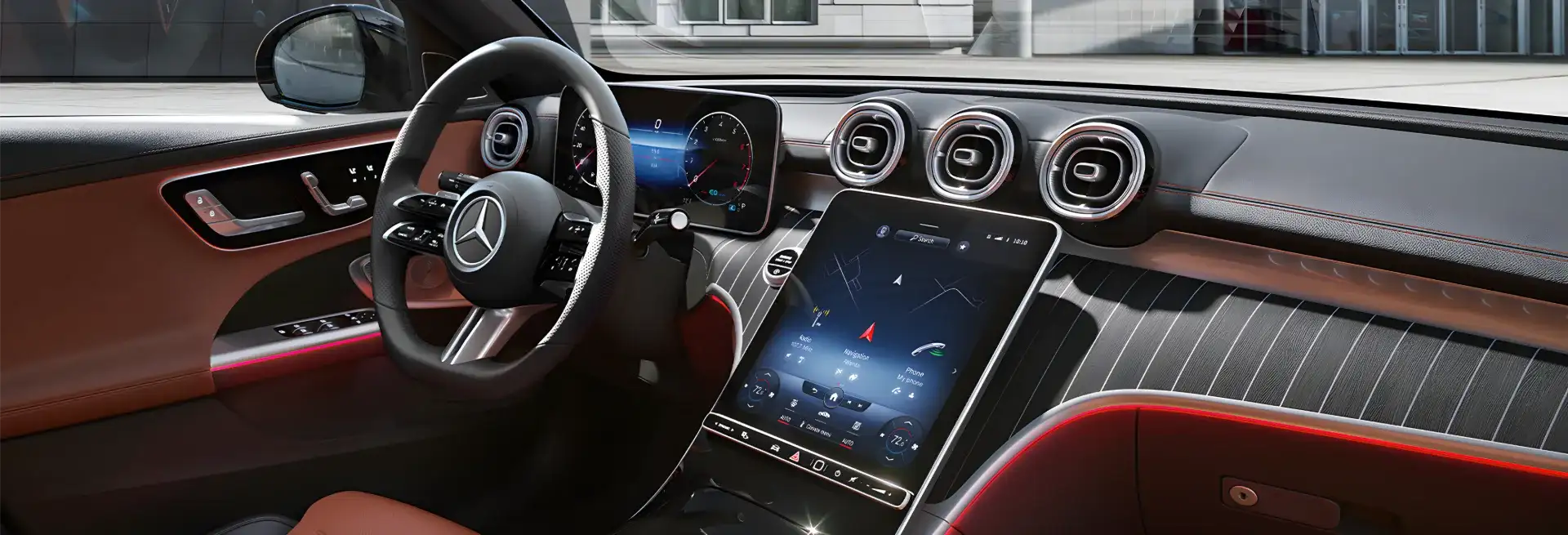 C-Class cockpit in saddle brown with the portrait central touchscreen.