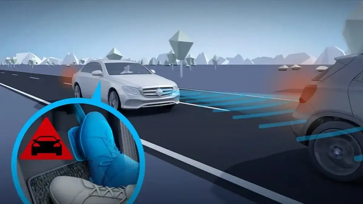 Illustration of a vehicle braking behind slower traffic with a collision warning icon.
