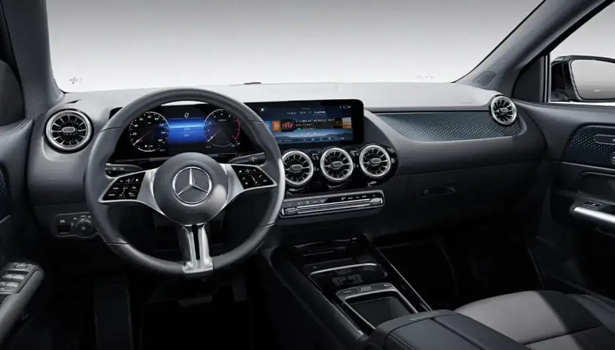GLA cabin showing the widescreen displays and aircraft-inspired round air vents.