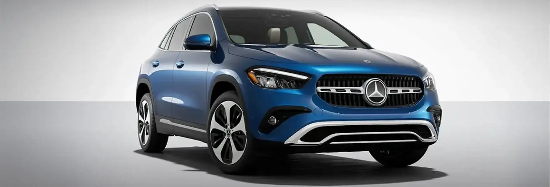 GLA 250 4MATIC SUV shown from a front three-quarter angle on a pale backdrop.