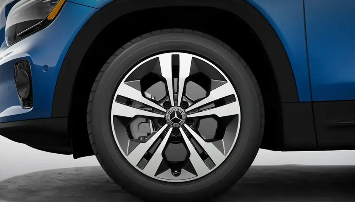 18-inch twin 5-spoke wheel with dark grey inlays on a blue GLB.