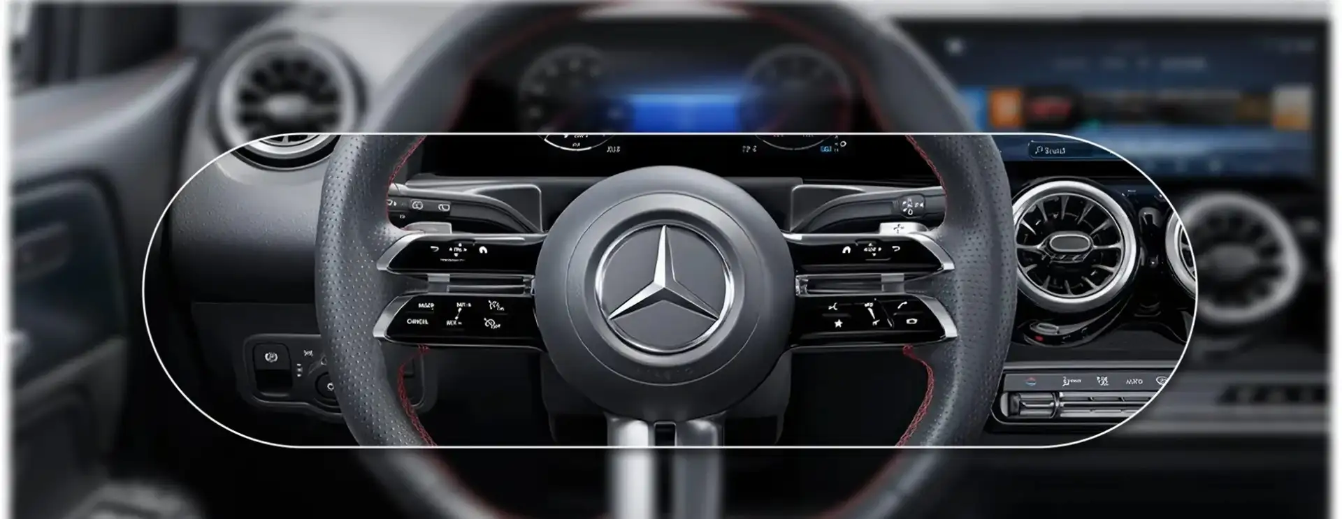 GLB cockpit showing the multifunction steering wheel, widescreen displays and turbine air vents.