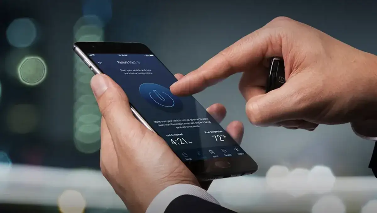 Smartphone showing the Mercedes-Benz app Remote Start screen beside a GLB.