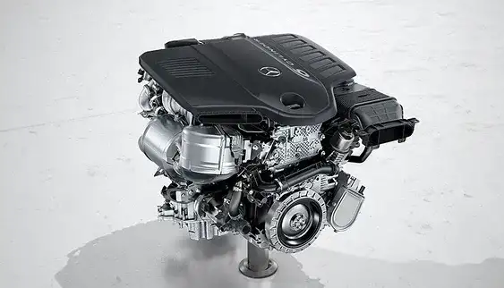 3.0L inline-6 turbo engine with mild hybrid drive displayed on a stand.
