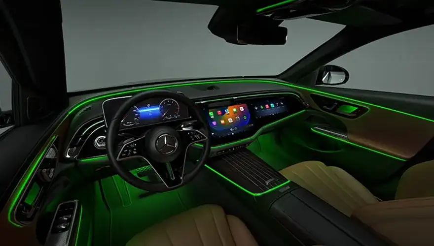 E-Class interior trim glowing with 64-color LED ambient lighting.