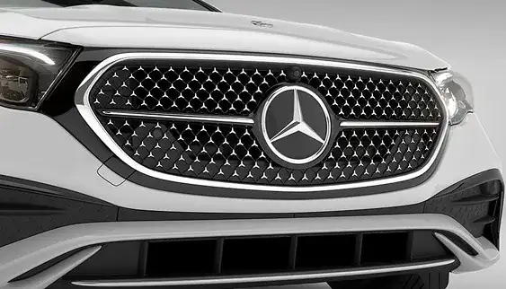 Chrome-outlined Star-pattern grille with the Three-Pointed Star centered on a gloss black crossbar.