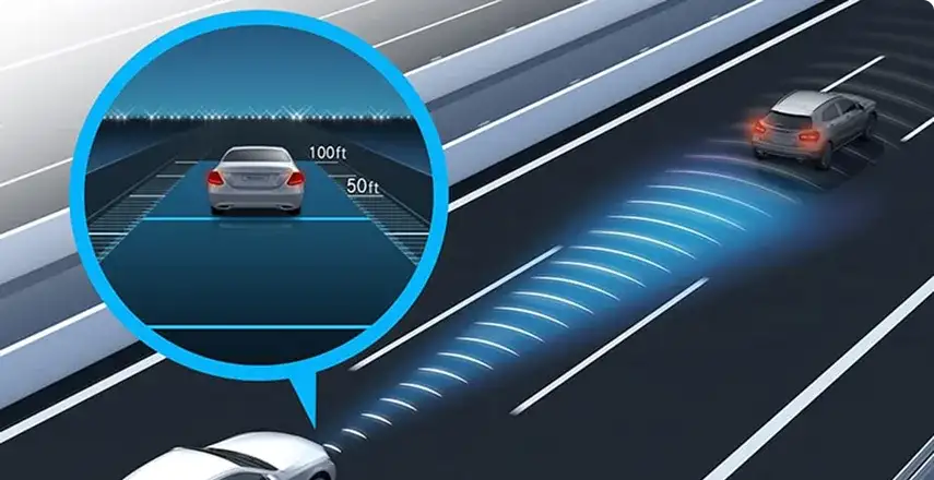 E-Class following traffic at a measured distance with DISTRONIC adaptive cruise control engaged.