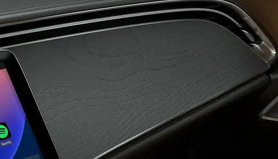 Natural Grain Black Ash wood trim running across the E-Class dashboard.