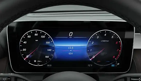 The 12.3-inch digital instrument cluster showing analog-style gauges.