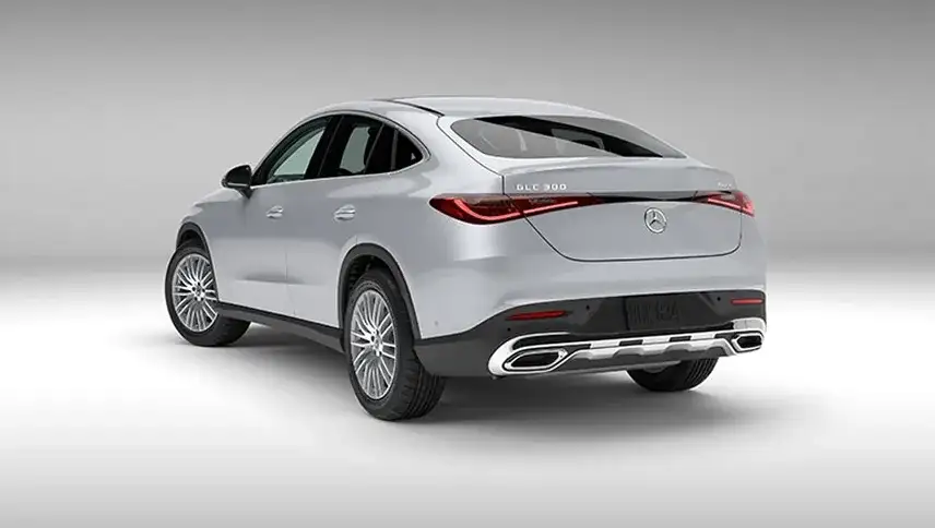 White GLC 300 4MATIC Coupe from a rear three-quarter angle, illustrating 4MATIC all-wheel drive.
