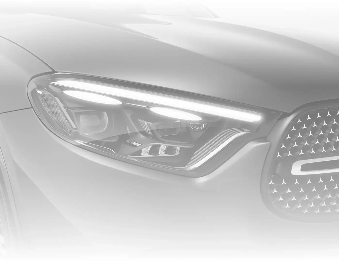 Blue GLC 300 4MATIC Coupe headlamp and grille shown in close-up.