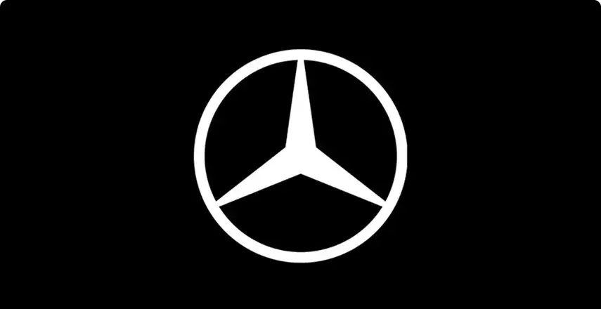 Mercedes-Benz star emblem on a black background, shown for the black rear spoiler accessory.