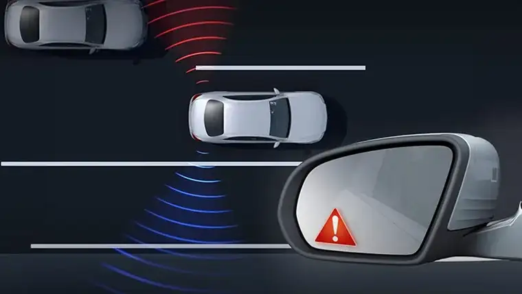 Illustration of the side mirror warning icon as a vehicle enters the blind spot.