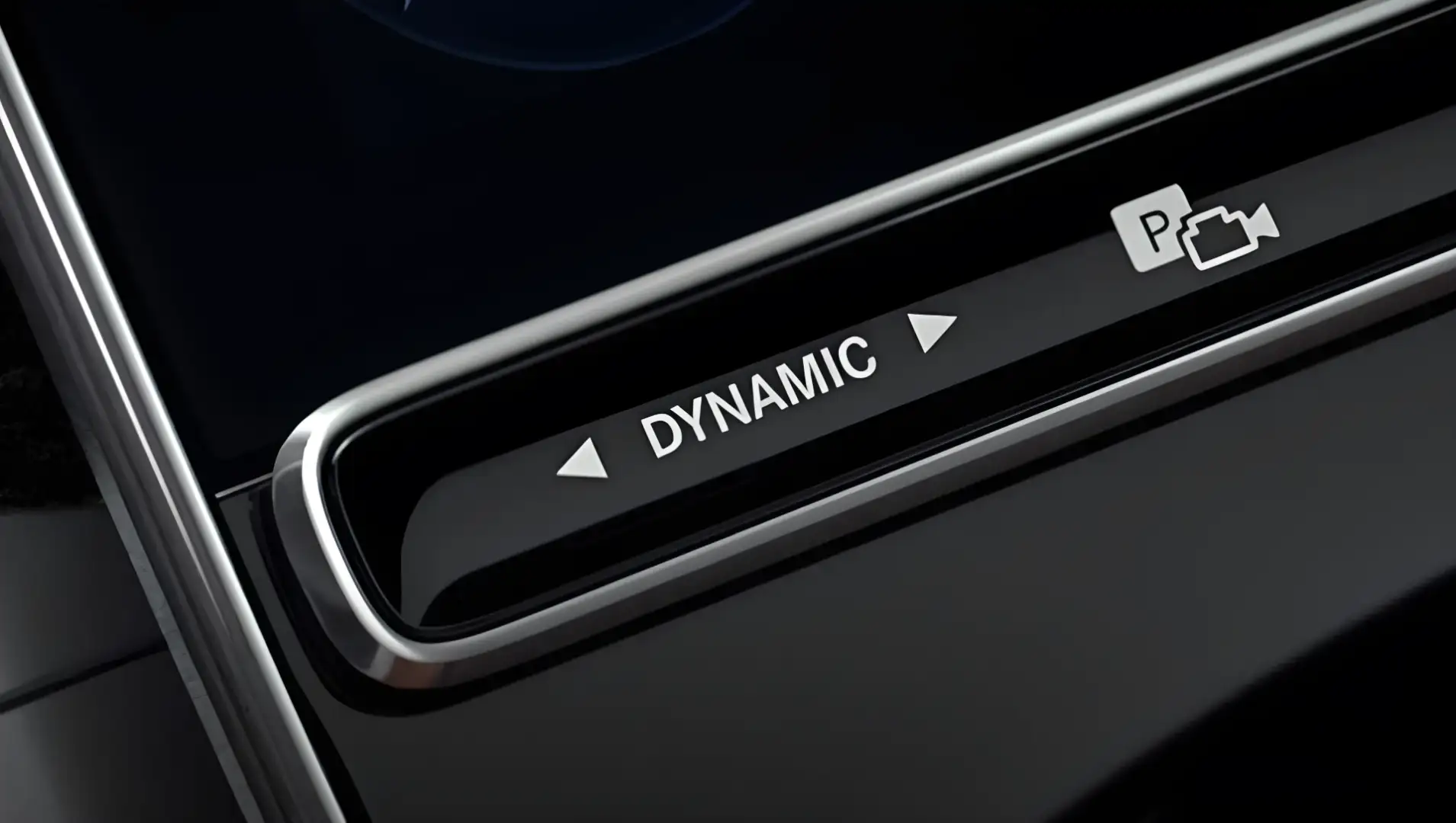 Close-up of the DYNAMIC SELECT drive program selector on the centre console.