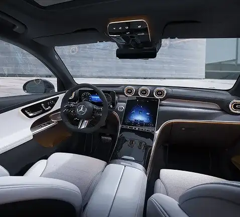 Front cabin of the GLC in light upholstery, looking across to the passenger side.