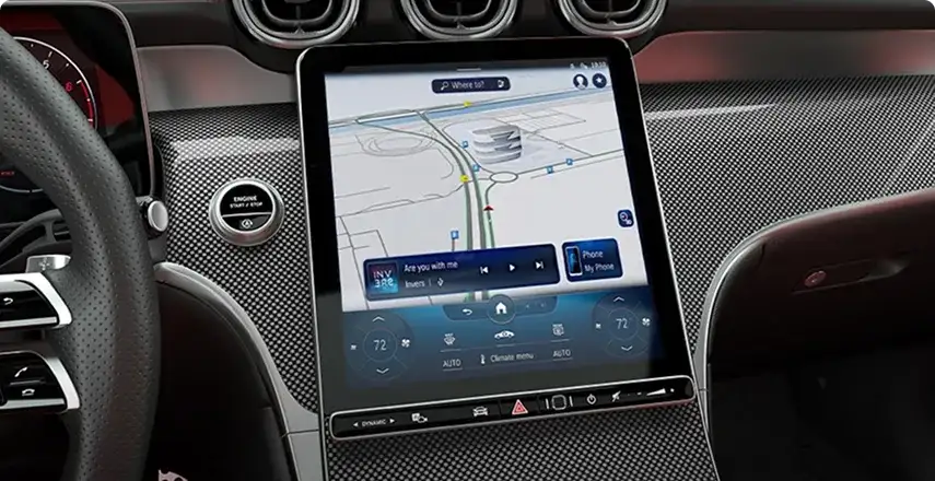 Portrait central touchscreen displaying an MB Navigation route map.