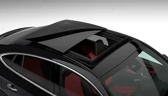 Panorama glass roof of the GLC Coupe seen from above, over a red leather interior.