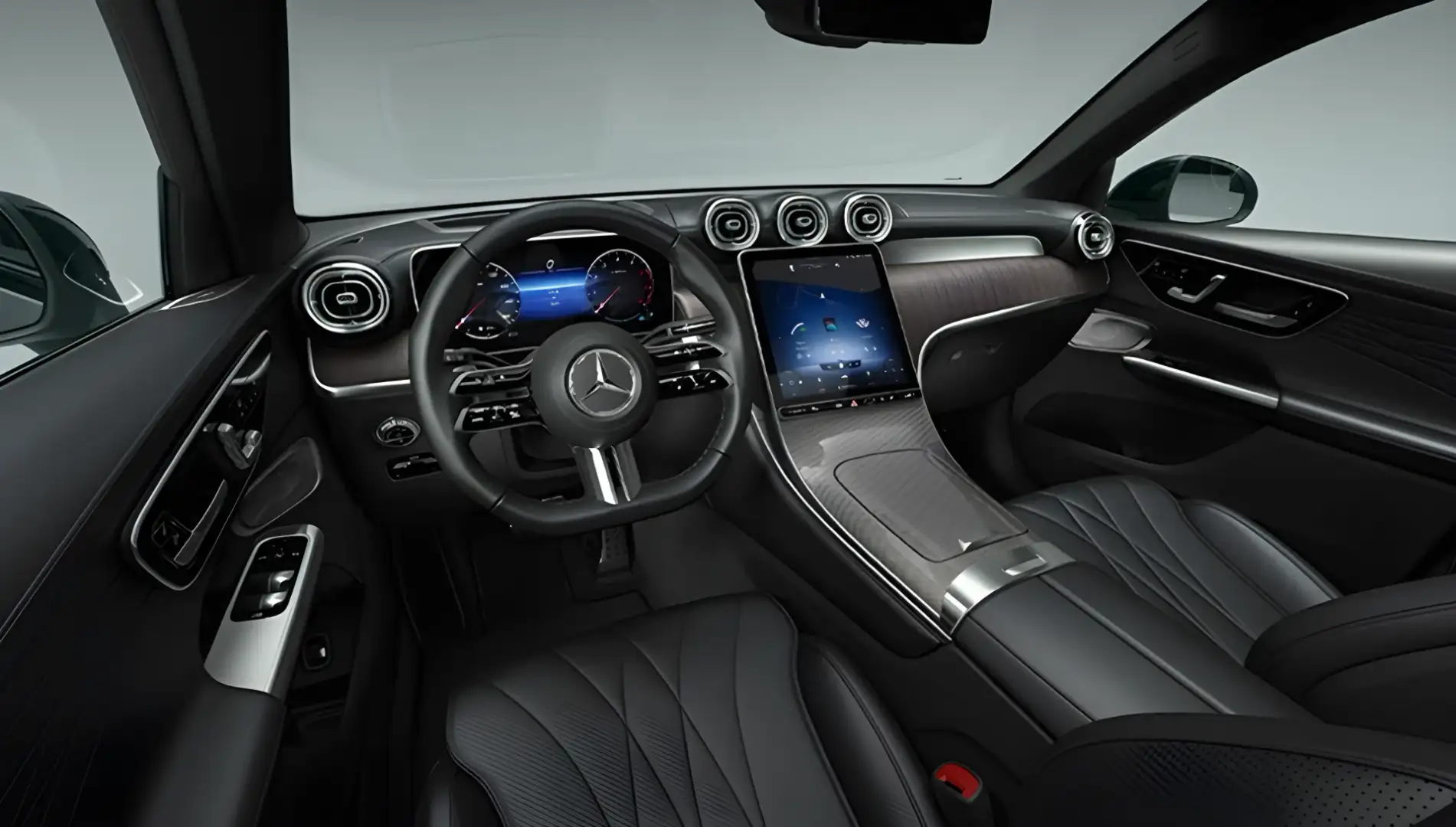 GLC cabin showing the flowing dashboard, round vents and portrait touchscreen.