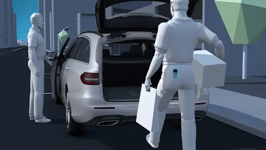 Illustration of HANDS-FREE ACCESS opening the GLC liftgate for someone carrying packages.