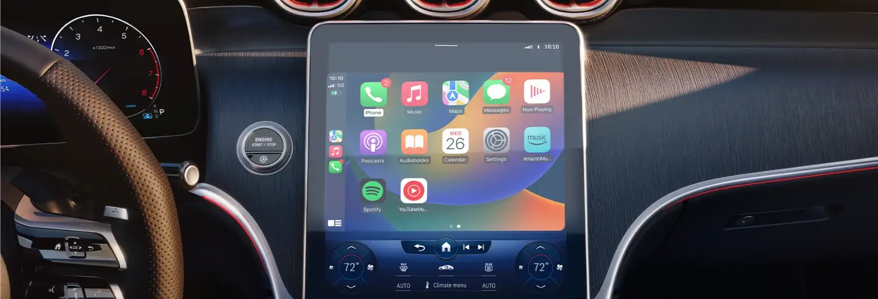 GLC 300 cockpit with the portrait central touchscreen and open-pore wood trim across the console.
