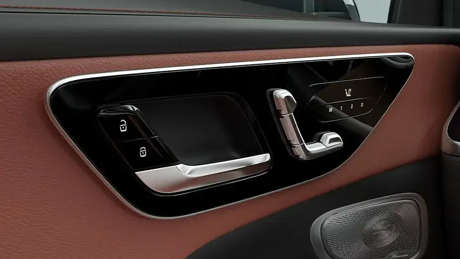 Seat-shaped power seat controls and memory buttons on the GLC 300 door panel.