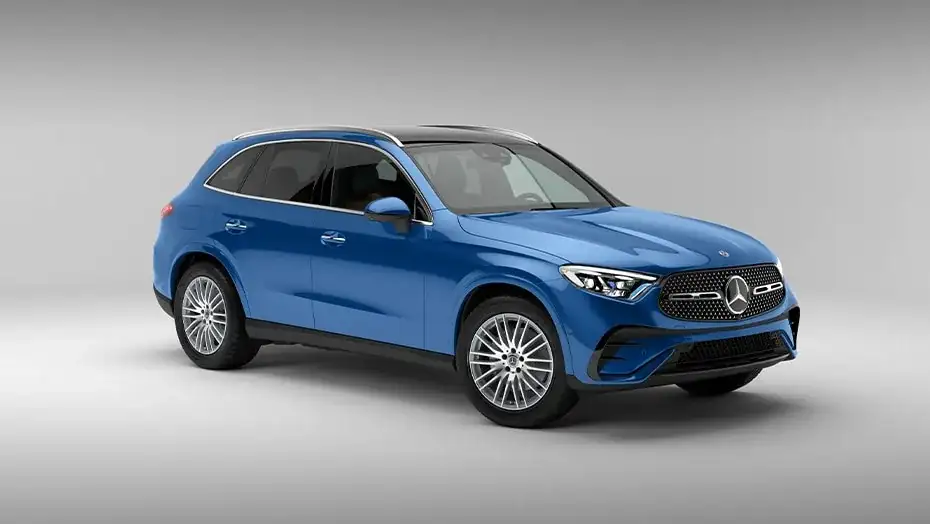 Blue 2027 GLC 300 4MATIC&reg; SUV in profile, showing its long hood and flared fenders.