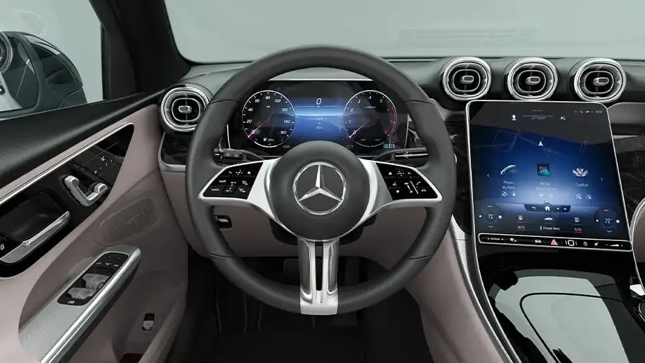 Leather-wrapped GLC 300 steering wheel with matte silver spoke trim in front of the digital displays.