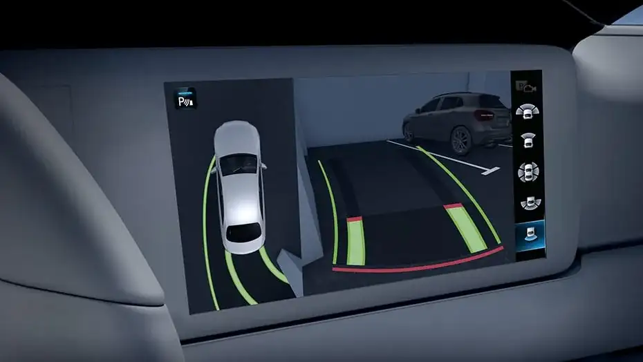 Central display showing the Surround View System overhead view of the GLC while parking.