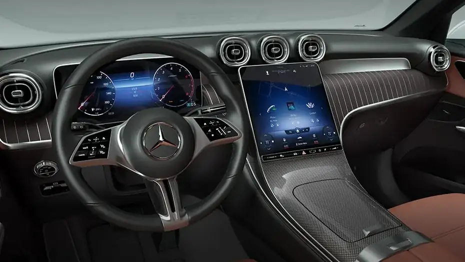GLC 300 cockpit with its digital instrument cluster, portrait touchscreen and round dash vents.