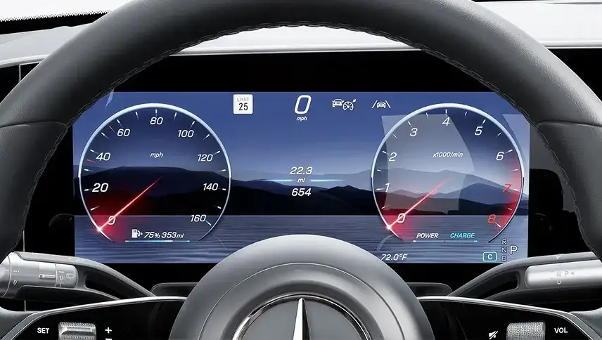12.3-inch digital instrument cluster showing twin round gauges behind the steering wheel.